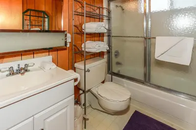 a bathroom with a toilet and a shower and a sink at MAKIN' MEMORIES AT SUMMIT #1683 in Big Bear Lake