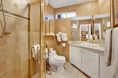 a bathroom with a toilet and a sink and a shower at Big bear happy place #2421 in Big Bear Lake