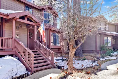 a house with an american flag on the front of it at Restmoore #2425 in Big Bear Lake