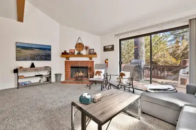 a living room with a couch and a fireplace at Restmoore #2425 in Big Bear Lake