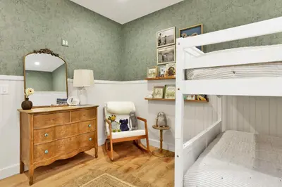 a bedroom with a bunk bed and a mirror at Pine meadow village castle #2301 in Big Bear Lake
