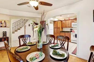 a kitchen and dining room with a table and chairs at Mockingbird getaway #2091 in Big Bear Lake