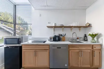 a kitchen with a sink and a dishwasher at Free Parking Pasadena Room near Convention Center & Caltech in Pasadena