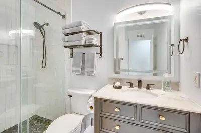 a bathroom with a toilet and a sink and a shower at Idyllic Tustin Home with Private Patio and Grill in Tustin