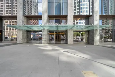 a building with a sign on the front of it at Brand New Modern & Luxury Residence in DTLA in Los Angeles