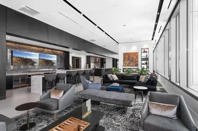 a living room with couches and a bar at Brand New Modern & Luxury Residence in DTLA in Los Angeles