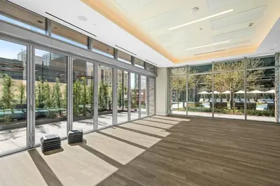 an empty room with large windows and floor to ceiling windows at Epitome of Luxury Condo in DTLA in Los Angeles