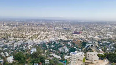 an aerial view of a city with buildings at A-Lister by AvantStay Hollywood Hills Luxe Group Escape w Pool in Los Angeles