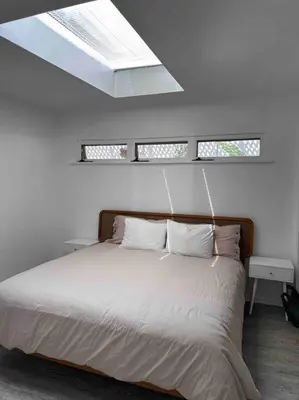 a bedroom with a large bed with a skylight at 30 PCT OFF!! Limited Time! Malibu Ocean Wave with King Bed, Walking to Beach and Hiking in Malibu