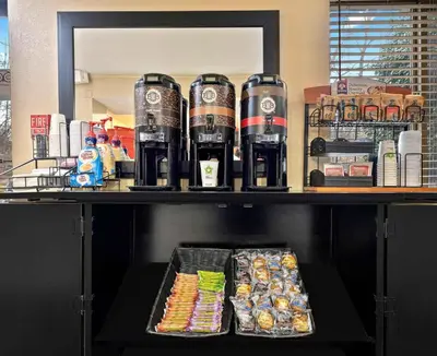 a shelf with drinks and food on it at Relax Suites Extended Stay - La Mirada in La Mirada