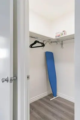 a room with a blue surfboard on the wall at Enjoy Alhambra Night Life at 2BR Apt in Alhambra
