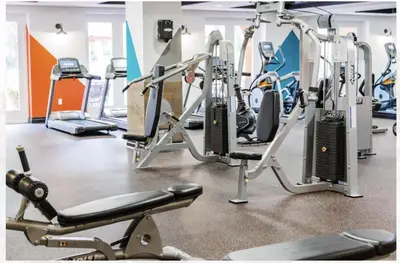 a gym with several treadmills and machines at Vacation Apartments in Marina Del Rey in Los Angeles