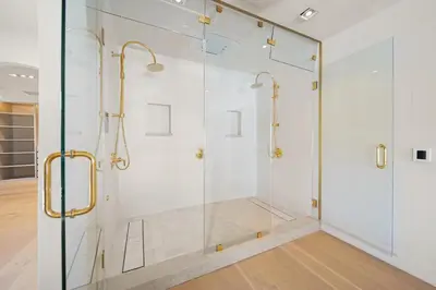 a shower with a glass door in a bathroom at Bella Villa in Los Angeles