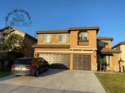 a car parked in a driveway in front of a house at Bella's sweet house 5640 in Eastvale