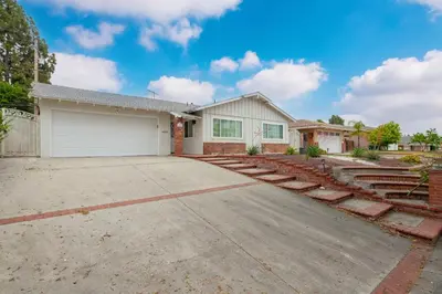 a house with a white garage at # Marbella Lane - Serene & Spacious 3BR Haven in West Covina