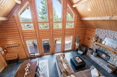 an overhead view of a living room in a log cabin at Lakeview Lodge - Across the street from the lake and Boulder Bay Park! in Big Bear Lake