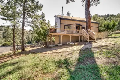 an exterior view of a house with a tree at Pine Mountain Club Cabin with AandC and EV Charger in Pine Mountain Club
