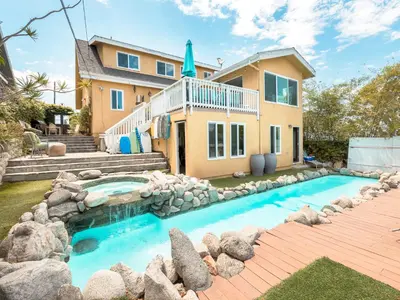 a home with a swimming pool in front of a house at El Segundo Beach 5B4b Home, POOL Hot Tub, BEACHES, Local Town! in El Segundo