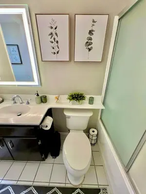 a bathroom with a toilet and a sink at Shared House Hollywood Hideaway Heart of Fame in Los Angeles