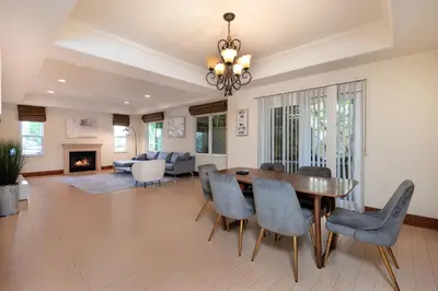 a dining room and living room with a table and chairs at Luxurious Apt Your Private Gem in LA in Los Angeles