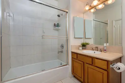 a bathroom with a tub and a sink and a shower at Luxurious Apt Your Private Gem in LA in Los Angeles