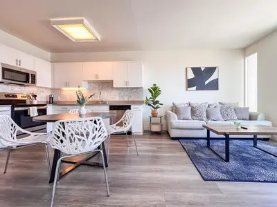 a living room with a couch and a table at Monthier Downtown SA5S1U0 in Los Angeles