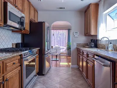 a kitchen with a stove and a sink at Monthier Picfair Village CA1H6O23 in Los Angeles