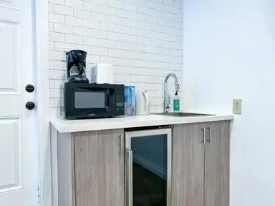 a kitchen counter with a microwave and a sink at Monthier Picfair Village CA1G6H23 in Los Angeles