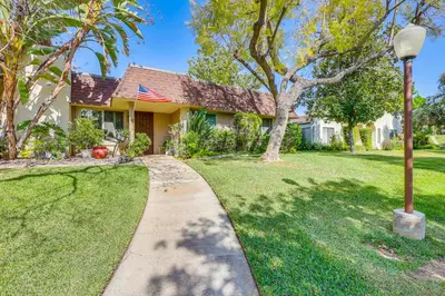 a house with a street light in the yard at Redlands Home with Community Perks 1 Mi to Downtown in Redlands