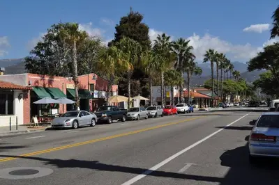 a city street with cars parked on the side of the road at Carpinteria Beach Studio Condo in Carpinteria
