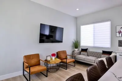 a living room with a couch and chairs at H&H New Built 2023 Hidden Gem Heart of OC 3 Queen Beds in Westminster