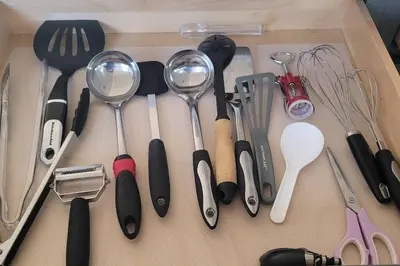 a group of kitchen utensils sitting on a table at H&H New Built 2023 Hidden Gem Heart of OC 3 Queen Beds in Westminster