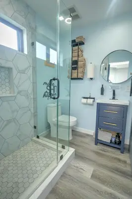 a bathroom with a shower with a toilet and a sink at Corner Haus Los Angeles in Los Angeles