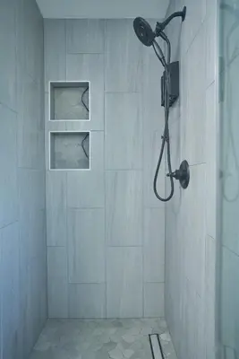 a bathroom with a shower with a shower head at Corner Haus Los Angeles in Los Angeles