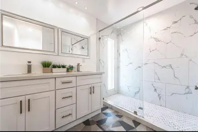 a white bathroom with a shower and a sink at Contemporary Private Room 7 in Los Angeles