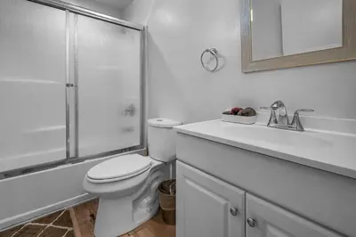 a bathroom with a toilet and a sink and a shower at Modern 1 Bedroom Loft in Hollywood with Full Kitchen and Central AC Free Gated Parking in Los Angeles