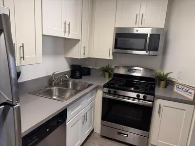 a kitchen with a sink and a microwave at Loft & Two Bedroom Hollywood apartments FREE Parking in Los Angeles