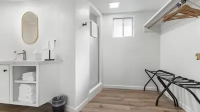 a bathroom with a sink and a mirror at Camp Nelson Lodge Room 9 in Ponderosa