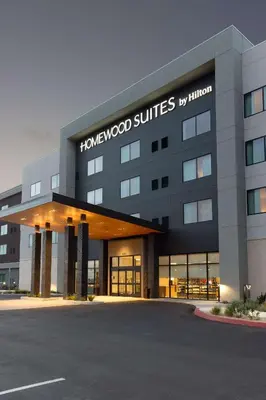 a building with the words honeywood suites on it at Homewood Suites by Hilton Cypress Orange County in Cypress