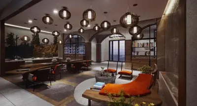 a large room with tables and chairs and lights at Sanctity Hotel Rancho Cucamonga, Tapestry Collection Hilton in Rancho Cucamonga