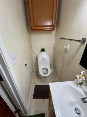a small bathroom with a toilet and a sink at Alhambra\u7cbe\u54c1\u5957\u623f\u72ec\u7acb\u536b\u6d74 in Alhambra
