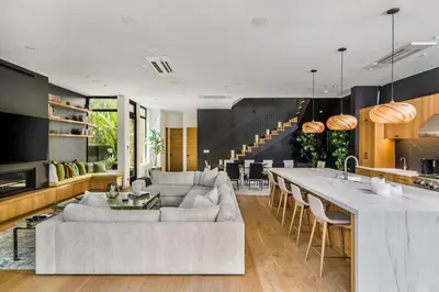a living room with a couch and a table at The Bella Villa Venice Beach - luxury interior design - spa and terrace in Los Angeles