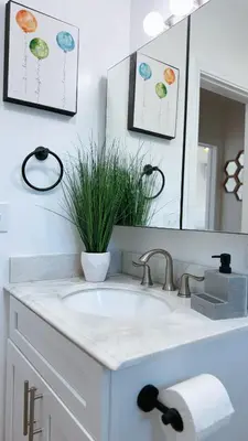 a bathroom with a sink and a mirror at Cozy 2B1B Apt Prime Location Newly Remodeled in Alhambra