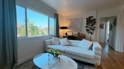 a living room with a white couch and a table at Cozy 2B1B Apt Prime Location Newly Remodeled in Alhambra
