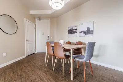 a dining room with a table and chairs at Spacious 3-Bedroom 3BTH Apt in Marina Del Rey! Pool, Hot Tub in Los Angeles