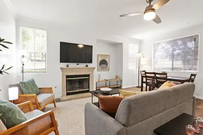 a living room with a couch and a fireplace at 4bd Townhouse - Special Limited Time Offer near Venice Beach! in Los Angeles