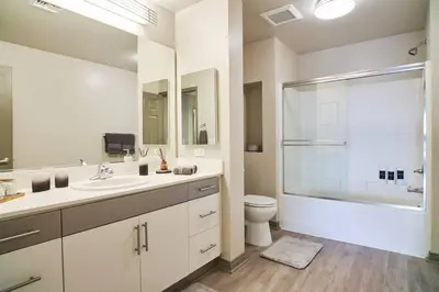 a bathroom with a sink and a toilet and a shower at Hollywood Townhome, Resort Amenities, 2 Free Parking Spaces! in Los Angeles