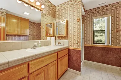 a bathroom with a sink and a mirror at Eagle point lake house #2471 in Big Bear Lake