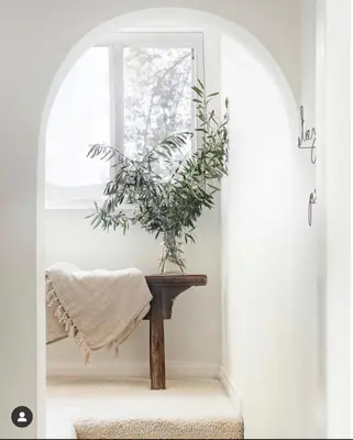 a plant sitting on a table next to a window at Zen Treehouse Retreat-Great Views & Peaceful Decks in Los Angeles