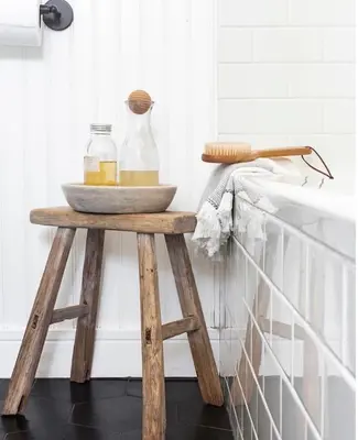a wooden stool with a bowl on it in a bathroom at Zen Treehouse Retreat-Great Views & Peaceful Decks in Los Angeles